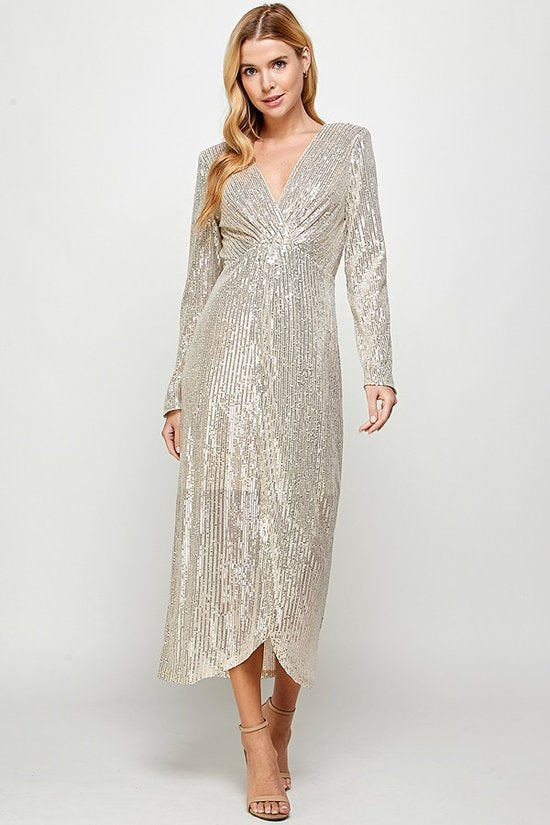 Long sleeve silver sequin gown with faux wrap style front
