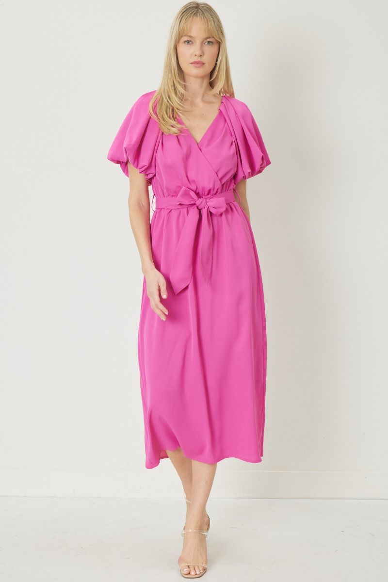 V-neck bubble puff sleeve midi dress featuring pleated shoulders and self tie at front. Slit at back skirt. Lined. Woven. Non-sheer. Lightweight.